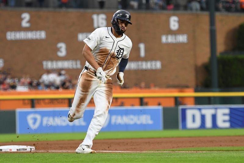 Sep 25, 2024; Detroit, Michigan, USA;  Detroit Tigers left fielder Riley Greene (31) runs to home plate to score a run against the Tampa Bay Rays in the first inning at Comerica Park. Mandatory Credit: Lon Horwedel-Imagn Images