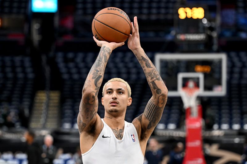 WASHINGTON, DC - OCTOBER 30: Kyle Kuzma #33 of the Washington Wizards warms up before the game against the Boston Celtics at Capital One Arena on October 30, 2023 in Washington, DC.  NOTE TO USER: User expressly acknowledges and agrees that, by downloading and or using this photograph, User is consenting to the terms and conditions of the Getty Images License Agreement.  (Photo by Greg Fiume/Getty Images)