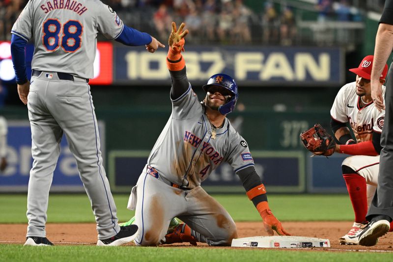 Jul 1, 2024; Washington, District of Columbia, USA; New York Mets catcher Francisco Alvarez (4) celebrates at third base after hitting a triple against the Washington Nationals during the tenth inning at Nationals Park. Mandatory Credit: Rafael Suanes-USA TODAY Sports