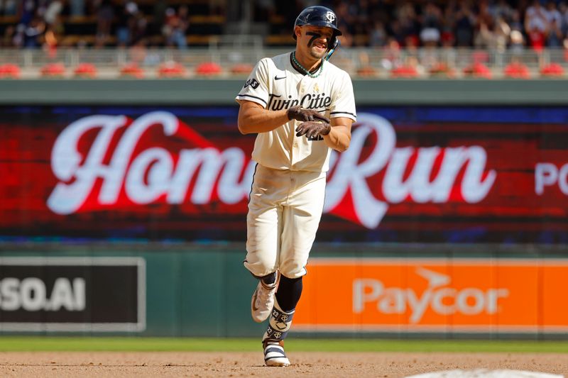 Sep 1, 2024; Minneapolis, Minnesota, USA; Minnesota Twins third baseman Royce Lewis (23) runs the bases on his three-run home run against the Toronto Blue Jays in the eighth inning at Target Field. Mandatory Credit: Bruce Kluckhohn-USA TODAY Sports