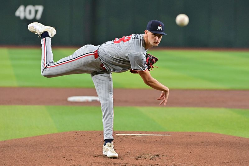 Jun 27, 2024; Phoenix, Arizona, USA;  Minnesota Twins pitcher David Festa (58) throws in the first inning against the Arizona Diamondbacks at Chase Field. Mandatory Credit: Matt Kartozian-USA TODAY Sports
