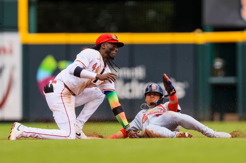 May 29, 2024; Cincinnati, Ohio, USA; Cincinnati Reds shortstop Elly De La Cruz (44) tags St. Louis Cardinals shortstop Masyn Winn (0) out at second in the ninth inning at Great American Ball Park. Mandatory Credit: Katie Stratman-USA TODAY Sports