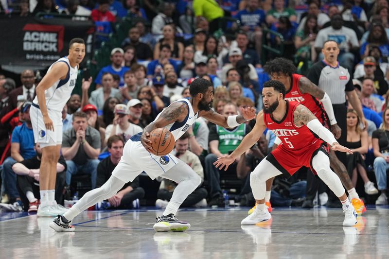 DALLAS, TX - APRIL 7: Fred VanVleet #5 of the Houston Rockets plays defense during the game against the Dallas Mavericks  on April 7, 2024 at the American Airlines Center in Dallas, Texas. NOTE TO USER: User expressly acknowledges and agrees that, by downloading and or using this photograph, User is consenting to the terms and conditions of the Getty Images License Agreement. Mandatory Copyright Notice: Copyright 2024 NBAE (Photo by Glenn James/NBAE via Getty Images)