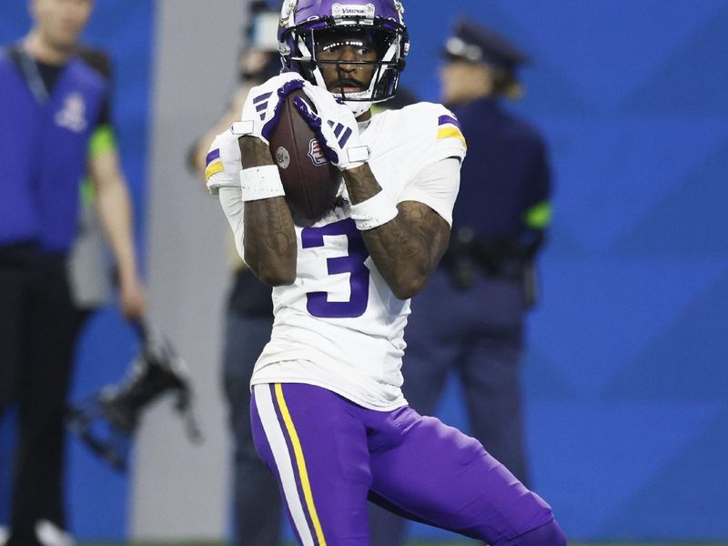 Minnesota Vikings wide receiver Jordan Addison (3) catches a 42-yard pass for a touchdown during the second half of an NFL football game against the Detroit Lions, Sunday, Jan. 7, 2024, in Detroit. (AP Photo/Duane Burleson)