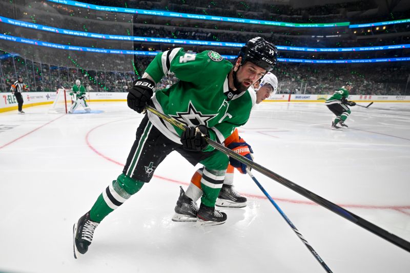 Oct 12, 2024; Dallas, Texas, USA; Dallas Stars left wing Jamie Benn (14) looks for the puck in the Stars zone during the third period against the New York Islanders at the American Airlines Center. Mandatory Credit: Jerome Miron-Imagn Images