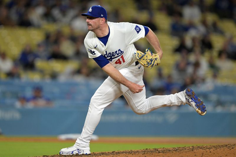 May 20, 2024; Los Angeles, California, USA;  Los Angeles Dodgers relief pitcher Daniel Hudson (41) throws a scoreless ninth inning against the Arizona Diamondbacks at Dodger Stadium. Mandatory Credit: Jayne Kamin-Oncea-USA TODAY Sports