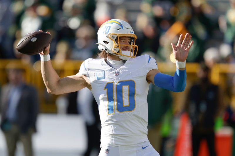 Los Angeles Chargers quarterback Justin Herbert works out prior to an NFL football game against the Green Bay Packers, Sunday, Nov. 19, 2023, in Green Bay, Wis. (AP Photo/Matt Ludtke)