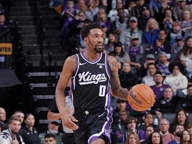 SACRAMENTO, CA - DECEMBER 18: Malik Monk #0 of the Sacramento Kings dribbles the ball during the game against the Washington Wizards on December 18, 2023 at Golden 1 Center in Sacramento, California. NOTE TO USER: User expressly acknowledges and agrees that, by downloading and or using this Photograph, user is consenting to the terms and conditions of the Getty Images License Agreement. Mandatory Copyright Notice: Copyright 2023 NBAE (Photo by Rocky Widner/NBAE via Getty Images)