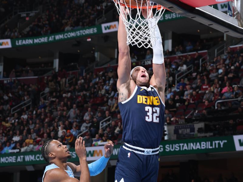 CLEVELAND, OH - DECEMBER 5: Aaron Gordon #32 of the Denver Nuggets dunks the ball during the game against the Cleveland Cavaliers on December 5, 2024 at Rocket Mortgage FieldHouse in Cleveland, Ohio. NOTE TO USER: User expressly acknowledges and agrees that, by downloading and or using this photograph, User is consenting to the terms and conditions of the Getty Images License Agreement. Mandatory Copyright Notice: Copyright 2024 NBAE (Photo by Jeff Haynes/NBAE via Getty Images)