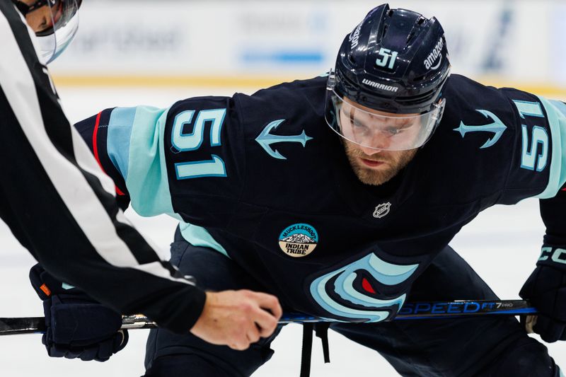 Oct 19, 2024; Seattle, Washington, USA; Seattle Kraken center Shane Wright (51) looks on before a face off against the Calgary Flames during the third period at Climate Pledge Arena. Mandatory Credit: Caean Couto-Imagn Images