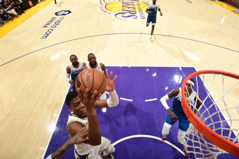 LOS ANGELES, CA - MARCH 10: Rui Hachimura #28 of the Los Angeles Lakers drives to the basket during the game against the Minnesota Timberwolves on March 10, 2024 at Crypto.Com Arena in Los Angeles, California. NOTE TO USER: User expressly acknowledges and agrees that, by downloading and/or using this Photograph, user is consenting to the terms and conditions of the Getty Images License Agreement. Mandatory Copyright Notice: Copyright 2024 NBAE (Photo by Adam Pantozzi/NBAE via Getty Images)