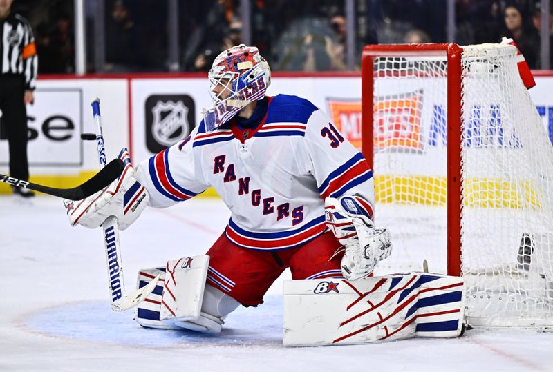 Feb 24, 2024; Philadelphia, Pennsylvania, USA; New York Rangers goalie Igor Shesterkin (31) makes a save against the Philadelphia Flyers in the third period at Wells Fargo Center. Mandatory Credit: Kyle Ross-USA TODAY Sports