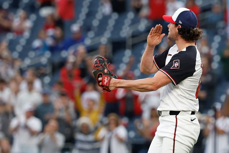 May 5, 2024; Washington, District of Columbia, USA; Washington Nationals pitcher Kyle Finnegan (67) celebrates after the final out against the Toronto Blue Jays at Nationals Park. Mandatory Credit: Geoff Burke-USA TODAY Sports
