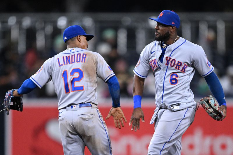 Jul 7, 2023; San Diego, California, USA; New York Mets shortstop Francisco Lindor (12) and right fielder Starling Marte (6) celebrate after defeating the San Diego Padres at Petco Park. Mandatory Credit: Orlando Ramirez-USA TODAY Sports