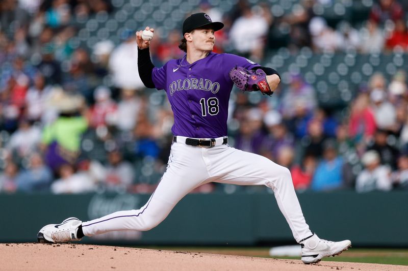 Apr 28, 2025; Denver, Colorado, USA; Colorado Rockies starting pitcher Ryan Feltner (18) pitches in the first inning against the Atlanta Braves at Coors Field. Mandatory Credit: Isaiah J. Downing-Imagn Images