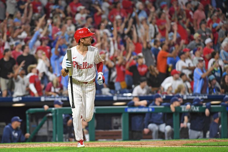 Sep 10, 2024; Philadelphia, Pennsylvania, USA; Philadelphia Phillies shortstop Trea Turner (7) watches his two run home run during the eighth inning against the Tampa Bay Rays at Citizens Bank Park. Mandatory Credit: Eric Hartline-Imagn Images