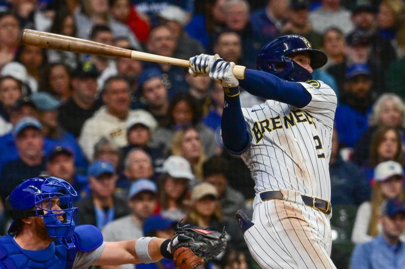 May 3, 2025; Milwaukee, Wisconsin, USA; Milwaukee Brewers second baseman Brice Turang (2) hits a single to drive in a run in the third inning against the Chicago Cubs at American Family Field. Mandatory Credit: Benny Sieu-Imagn Images