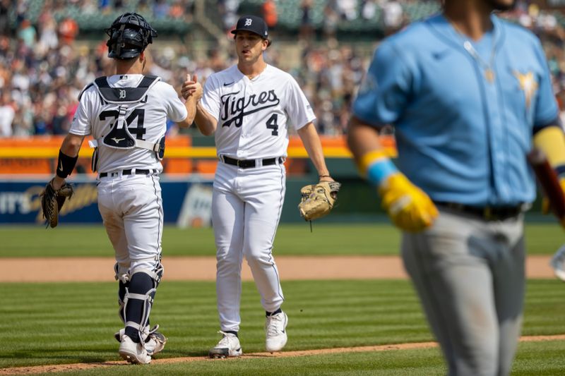 Aug 5, 2023; Detroit, Michigan, USA; Detroit Tigers relief pitcher Beau Brieske (4) celebrates the victory over the Tampa Bay Rays with catcher Jake Rogers (34) at Comerica Park. Mandatory Credit: David Reginek-USA TODAY Sports