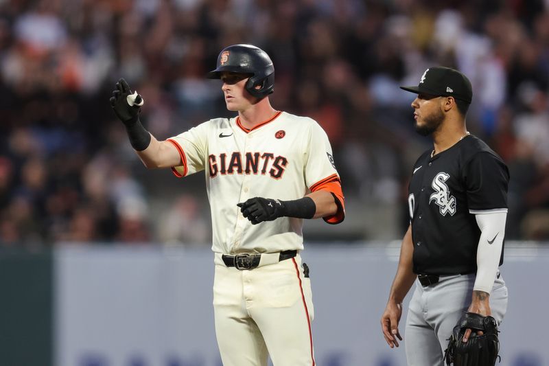 Aug 19, 2024; San Francisco, California, USA; San Francisco Giants shortstop Tyler Fitzgerald (49) hits an RBI double during the fifth inning against the Chicago White Sox at Oracle Park. Mandatory Credit: Sergio Estrada-USA TODAY Sports