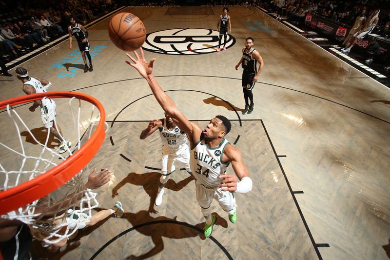 BROOKLYN, NY - DECEMBER 8: Giannis Antetokounmpo #34 of the Milwaukee Bucks shoots the ball during the game against the Brooklyn Nets on December 8, 2024 at Barclays Center in Brooklyn, New York. NOTE TO USER: User expressly acknowledges and agrees that, by downloading and or using this Photograph, user is consenting to the terms and conditions of the Getty Images License Agreement. Mandatory Copyright Notice: Copyright 2024 NBAE (Photo by Nathaniel S. Butler/NBAE via Getty Images)