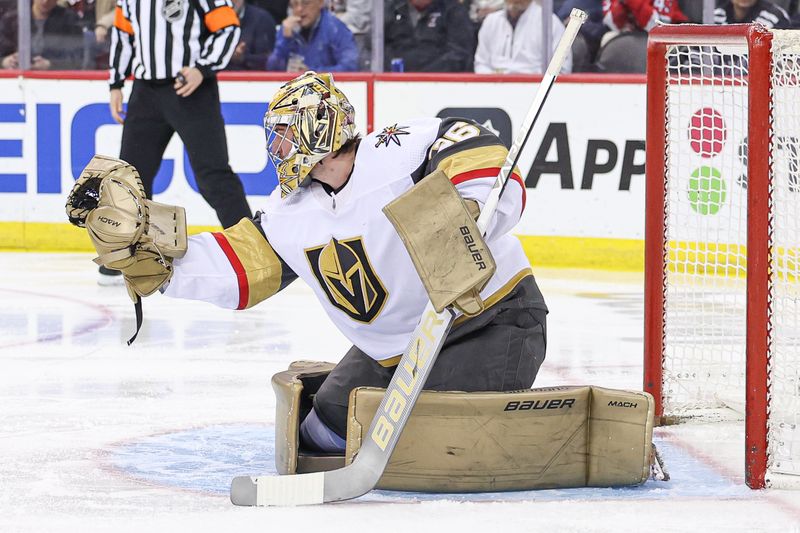 Jan 22, 2024; Newark, New Jersey, USA; Vegas Golden Knights goaltender Logan Thompson (36) makes a glove save during the third period against the New Jersey Devils at Prudential Center. Mandatory Credit: Vincent Carchietta-USA TODAY Sports