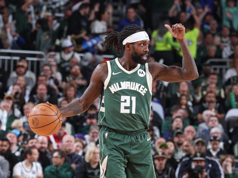 MILWAUKEE, WI - APRIL 21:  Patrick Beverley #21 of the Milwaukee Bucks handles the ball during the game  against the Indiana Pacers during Round 1 Game 1 of the 2024 NBA Playoffs  on April 21, 2024 at the Fiserv Forum Center in Milwaukee, Wisconsin. NOTE TO USER: User expressly acknowledges and agrees that, by downloading and or using this Photograph, user is consenting to the terms and conditions of the Getty Images License Agreement. Mandatory Copyright Notice: Copyright 2024 NBAE (Photo by Jeff Haynes/NBAE via Getty Images).