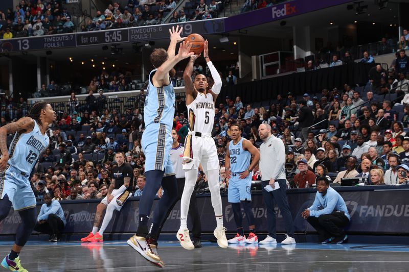 MEMPHIS, TN - NOVEMBER 29: Dejounte Murray #5 of the New Orleans Pelicans shoots the ball during the game against the Memphis Grizzlies during the Emirates NBA Cup game on November 29, 2024 at FedExForum in Memphis, Tennessee. NOTE TO USER: User expressly acknowledges and agrees that, by downloading and or using this photograph, User is consenting to the terms and conditions of the Getty Images License Agreement. Mandatory Copyright Notice: Copyright 2024 NBAE (Photo by Joe Murphy/NBAE via Getty Images)