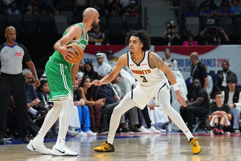 ABU DHABI, UAE - OCTOBER 4: Julian Strawther #3 of the Denver Nuggets plays defense during the game against the Boston Celtics during the 2024 Global Games on October 4, 2024 at the Etihad Arena in Abu Dhabi, United Arab Emirates. NOTE TO USER: User expressly acknowledges and agrees that, by downloading and/or using this Photograph, user is consenting to the terms and conditions of the Getty Images License Agreement. Mandatory Copyright Notice: Copyright 2024 NBAE (Photo by Garrett Ellwood/NBAE via Getty Images)