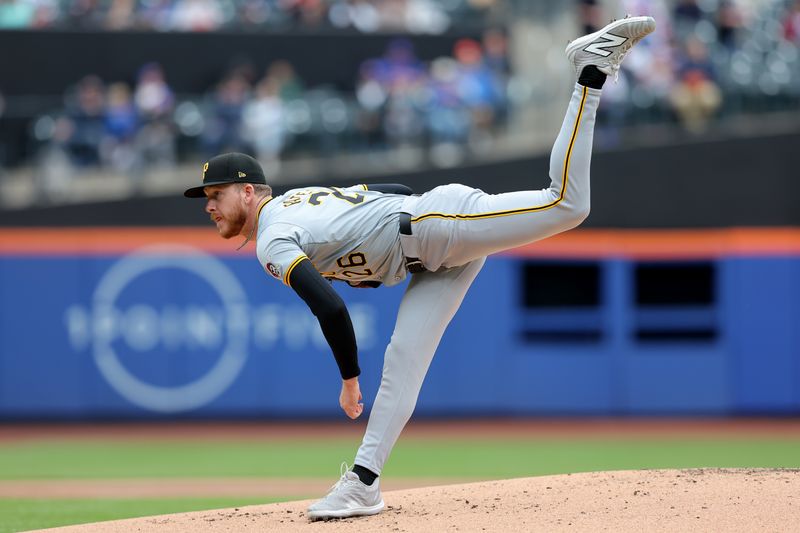 Apr 17, 2024; New York City, New York, USA; Pittsburgh Pirates starting pitcher Bailey Falter (26) follows through on a pitch against the New York Mets during the first inning at Citi Field. Mandatory Credit: Brad Penner-USA TODAY Sports