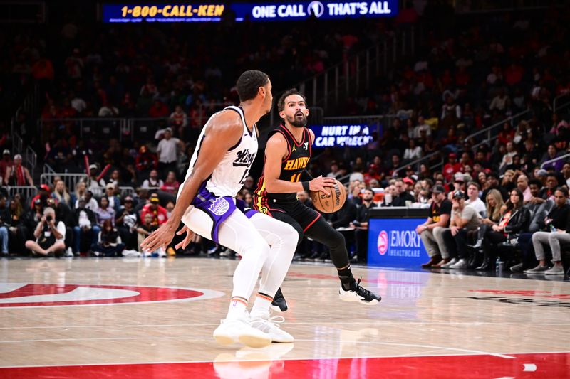 ATLANTA, GA - NOVEMBER 1: Trae Young #11 of the Atlanta Hawks handles the ball during the game against the Sacramento Kings on November 1, 2024 at State Farm Arena in Atlanta, Georgia.  NOTE TO USER: User expressly acknowledges and agrees that, by downloading and/or using this Photograph, user is consenting to the terms and conditions of the Getty Images License Agreement. Mandatory Copyright Notice: Copyright 2024 NBAE (Photo by Adam Hagy/NBAE via Getty Images)