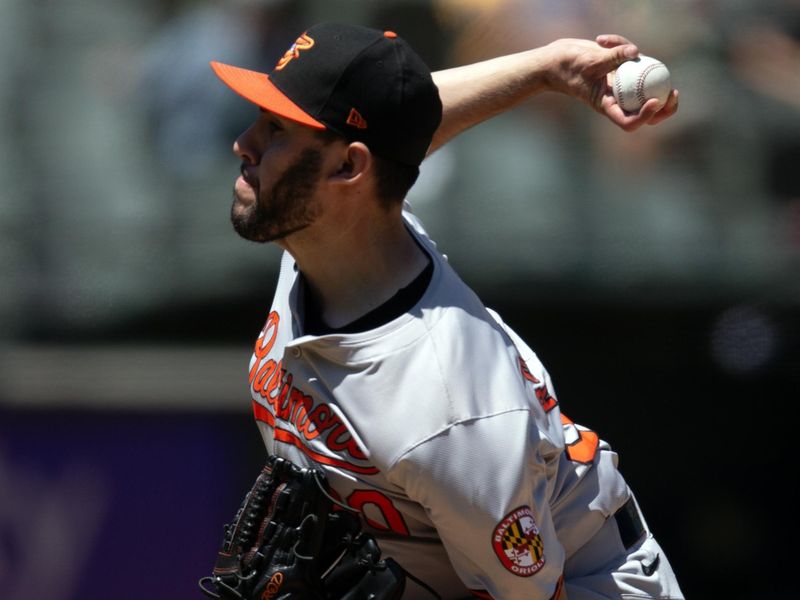 Jul 7, 2024; Oakland, California, USA; Baltimore Orioles starting pitcher Grayson Rodriguez (30) delivers a pitch against the Oakland Athletics during the fifth inning at Oakland-Alameda County Coliseum. Mandatory Credit: D. Ross Cameron-USA TODAY Sports