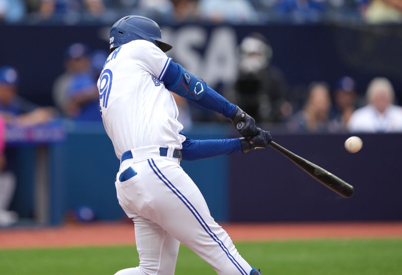 Sep 10, 2023; Toronto, Ontario, CAN; Toronto Blue Jays center fielder Kevin Kiermaier (39) hits a home run against the Kansas City Royals during the seventh inning at Rogers Centre. Mandatory Credit: Nick Turchiaro-USA TODAY Sports