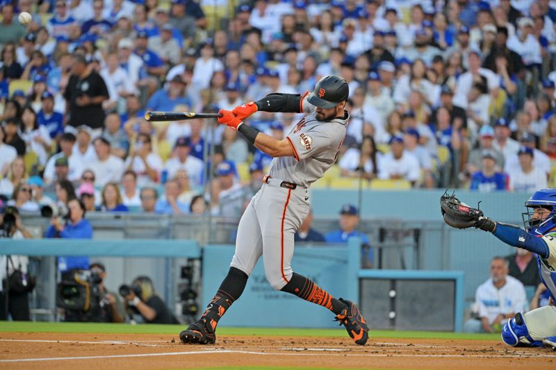 Sep 20, 2025; Los Angeles, California, USA; San Francisco Giants first base Bryce Eldridge (78) hits a double during the first inning against Los Angeles Dodgers at Dodger Stadium. Mandatory Credit: Jayne Kamin-Oncea-Imagn Images