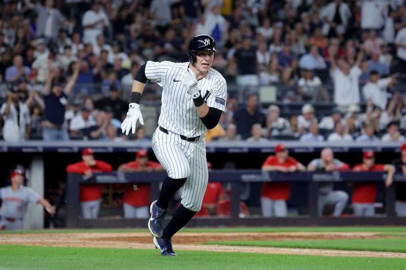 Jul 2, 2024; Bronx, New York, USA; New York Yankees first baseman Ben Rice (93) runs out his two run double against the Cincinnati Reds during the sixth inning at Yankee Stadium. Mandatory Credit: Brad Penner-USA TODAY Sports