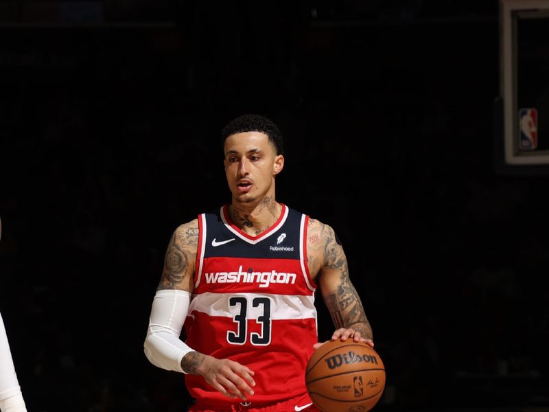 WASHINGTON, DC -? MARCH 8:  Kyle Kuzma #33 of the Washington Wizards handles the ball during the game  on March 8, 2024 at Capital One Arena in Washington, DC. NOTE TO USER: User expressly acknowledges and agrees that, by downloading and or using this Photograph, user is consenting to the terms and conditions of the Getty Images License Agreement. Mandatory Copyright Notice: Copyright 2024 NBAE (Photo by Stephen Gosling/NBAE via Getty Images)