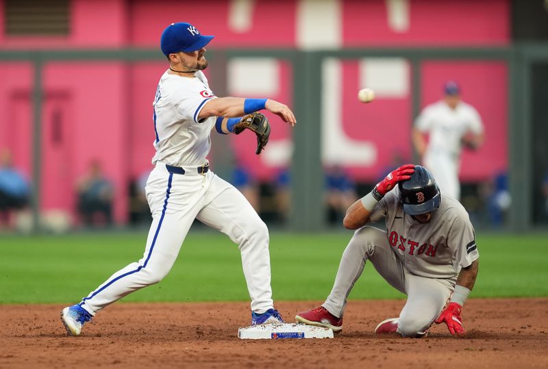 Aug 7, 2024; Kansas City, Missouri, USA; Kansas City Royals second baseman Michael Massey (19) throws to first base after forcing out Boston Red Sox center fielder Ceddanne Rafaela (43) during the third inning at Kauffman Stadium. Mandatory Credit: Jay Biggerstaff-USA TODAY Sports