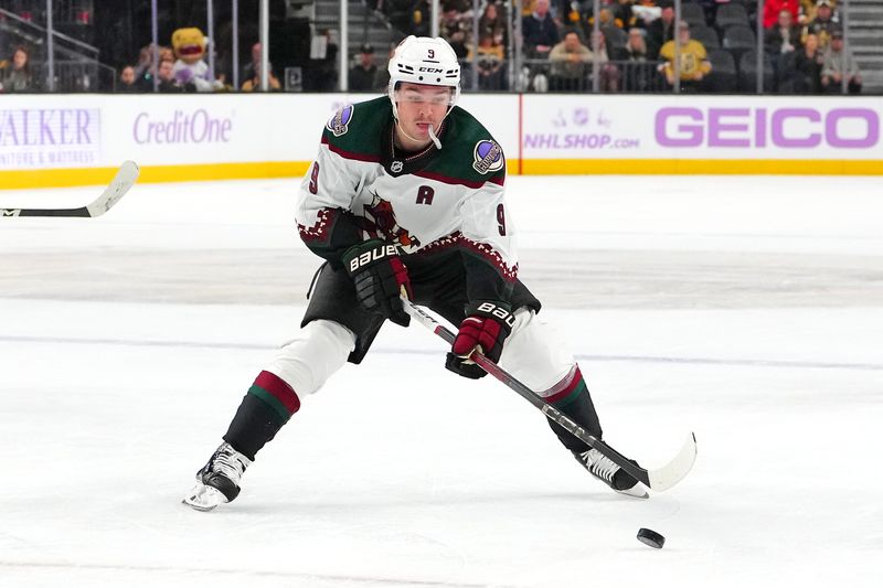 Nov 25, 2023; Las Vegas, Nevada, USA; Arizona Coyotes right wing Clayton Keller (9) skates against the Vegas Golden Knights during the second period at T-Mobile Arena. Mandatory Credit: Stephen R. Sylvanie-USA TODAY Sports