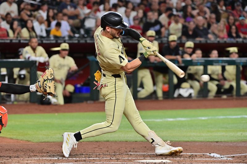 Jun 4, 2024; Phoenix, Arizona, USA;  Arizona Diamondbacks shortstop Blaze Alexander (9) doubles in the third inning against the San Francisco Giants at Chase Field. Mandatory Credit: Matt Kartozian-USA TODAY Sports