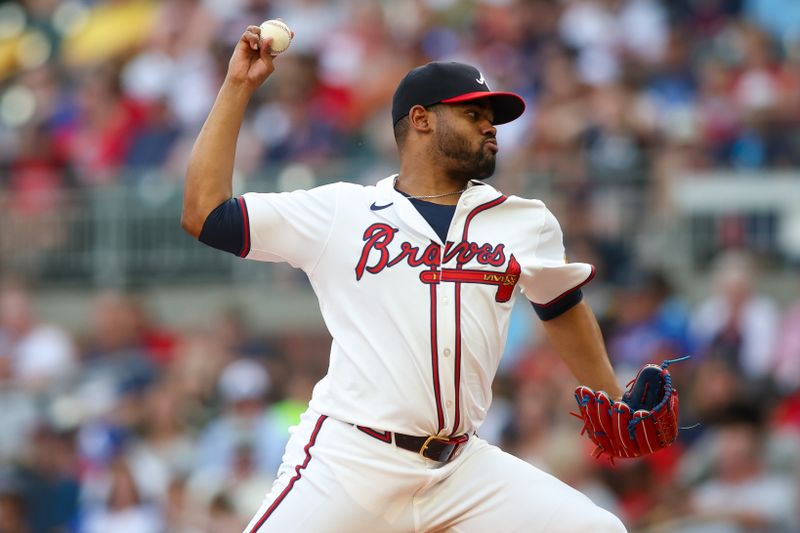 Jul 22, 2024; Atlanta, Georgia, USA; Atlanta Braves starting pitcher Reynaldo Lopez (40) throws against the Cincinnati Reds in the second inning at Truist Park. Mandatory Credit: Brett Davis-USA TODAY Sports
