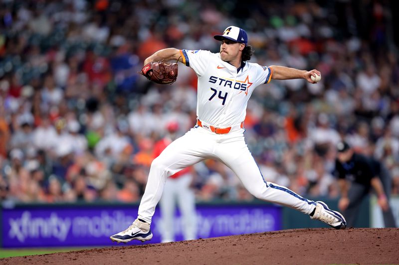 Apr 13, 2025; Houston, Texas, USA; Houston Astros relief pitcher Bryan King (74) pitches against the Los Angeles Angels during the seventh inning at Daikin Park. Mandatory Credit: Erik Williams-Imagn Images