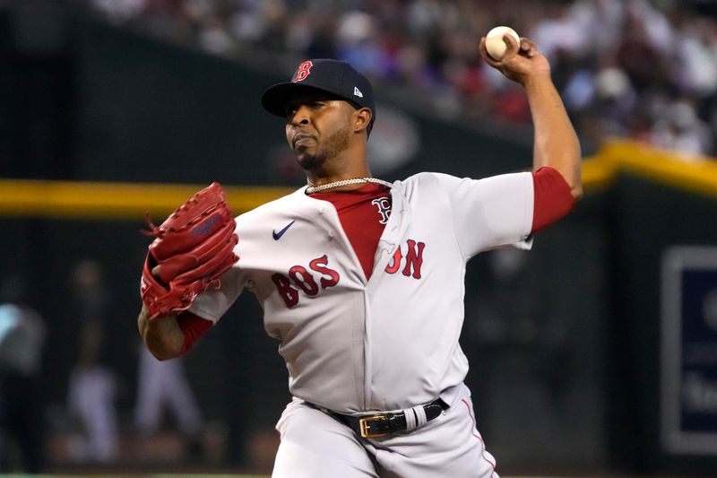 May 28, 2023; Phoenix, Arizona, USA; Boston Red Sox relief pitcher Joely Rodriguez (57) throws against the Arizona Diamondbacks in the fifth inning at Chase Field. Mandatory Credit: Rick Scuteri-USA TODAY Sports