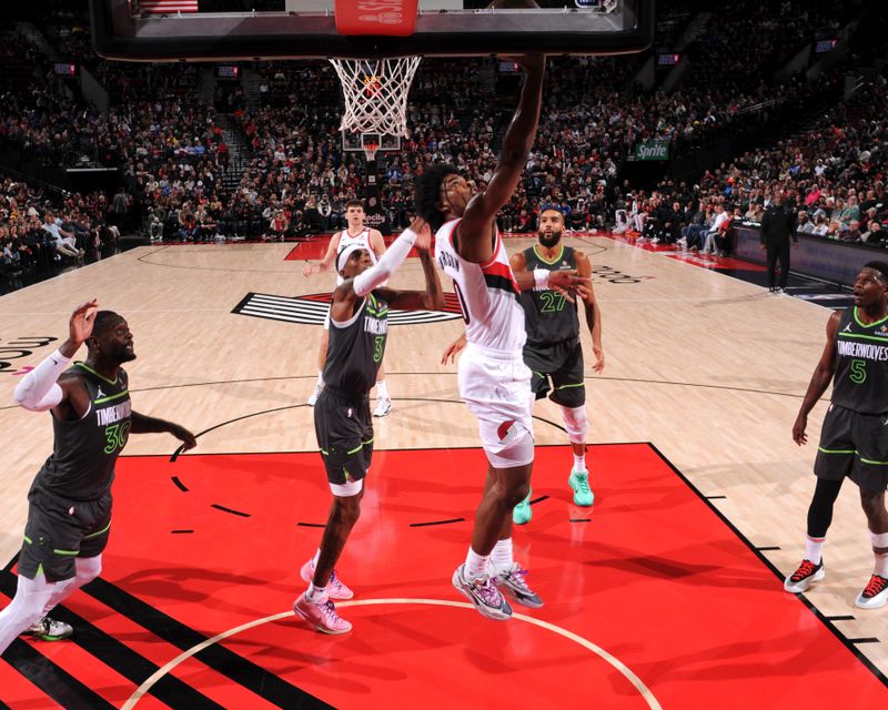 PORTLAND, OR - NOVEMBER 13: Scoot Henderson #00 of the Portland Trail Blazers drives to the basket during the game against the Minnesota Timberwolves on November 13, 2024 at the Moda Center Arena in Portland, Oregon. NOTE TO USER: User expressly acknowledges and agrees that, by downloading and or using this photograph, user is consenting to the terms and conditions of the Getty Images License Agreement. Mandatory Copyright Notice: Copyright 2024 NBAE (Photo by Cameron Browne/NBAE via Getty Images)