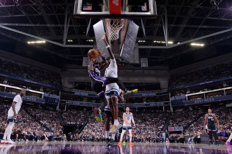 SACRAMENTO, CA - OCTOBER 24: Keon Ellis #23 of the Sacramento Kings drives to the basket during the game against the Minnesota Timberwolves on October 24, 2024 at Golden 1 Center in Sacramento, California. NOTE TO USER: User expressly acknowledges and agrees that, by downloading and or using this Photograph, user is consenting to the terms and conditions of the Getty Images License Agreement. Mandatory Copyright Notice: Copyright 2024 NBAE (Photo by Rocky Widner/NBAE via Getty Images)