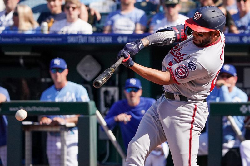 May 27, 2023; Kansas City, Missouri, USA; Washington Nationals first baseman Dominic Smith (22) singles against the Kansas City Royals in the sixth inning at Kauffman Stadium. Mandatory Credit: Denny Medley-USA TODAY Sports