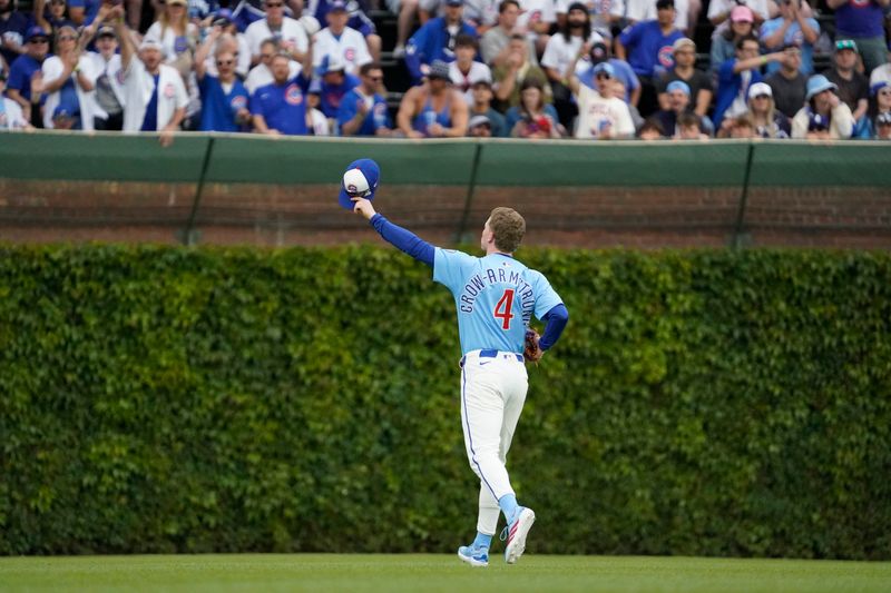 May 30, 2025; Chicago, Illinois, USA; Chicago Cubs outfielder Pete Crow-Armstrong (4) waves to the fans before the game against the Cincinnati Reds at Wrigley Field. Mandatory Credit: David Banks-Imagn Images