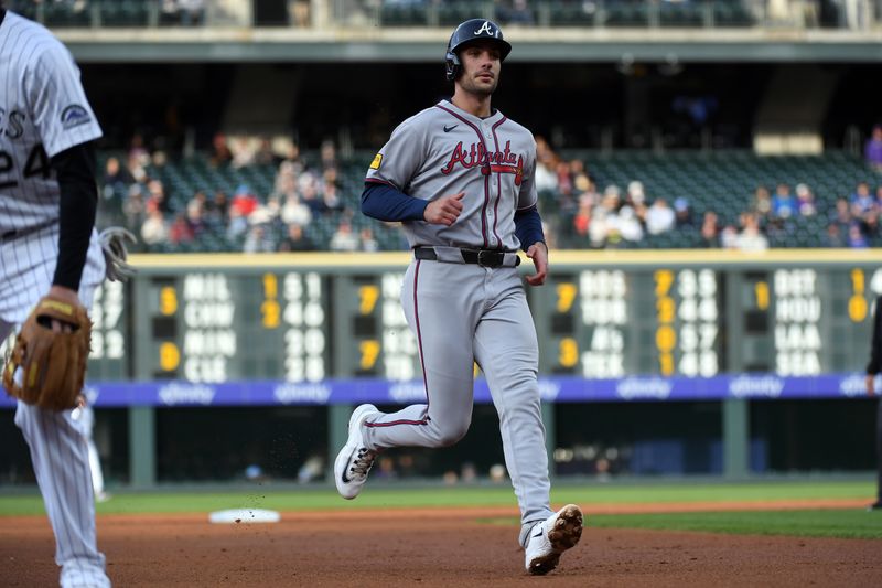 Apr 29, 2025; Denver, Colorado, USA; Atlanta Braves first base Matt Olson (28) advances to third during the second inning against the Colorado Rockies at Coors Field. Mandatory Credit: Christopher Hanewinckel-Imagn Images