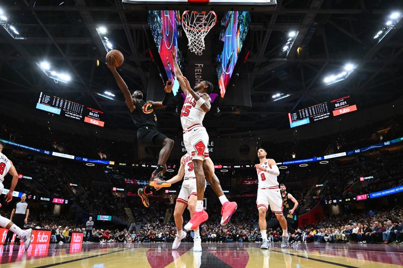 CLEVELAND, OHIO - NOVEMBER 15: Caris LeVert #3 of the Cleveland Cavaliers shoots over Dalen Terry #25 of the Chicago Bulls during the third quarter of the Emirates NBA Cup game at Rocket Mortgage Fieldhouse on November 15, 2024 in Cleveland, Ohio. The Cavaliers defeated the Bulls 144-126. NOTE TO USER: User expressly acknowledges and agrees that, by downloading and or using this photograph, User is consenting to the terms and conditions of the Getty Images License Agreement. (Photo by Jason Miller/Getty Images)