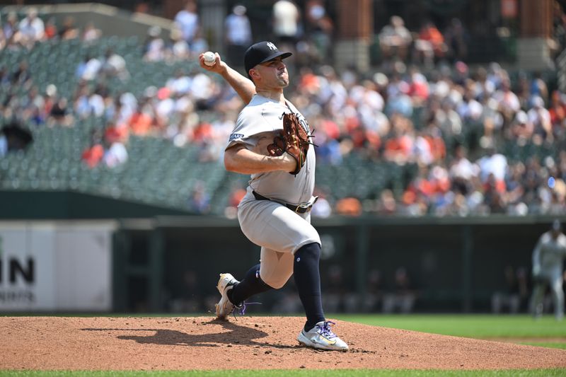 Jul 14, 2024; Baltimore, Maryland, USA;  New York Yankees pitcher Carlos Rodón (55) delivers a first inning pitch against the Baltimore Orioles at Oriole Park at Camden Yards. Mandatory Credit: James A. Pittman-USA TODAY Sports