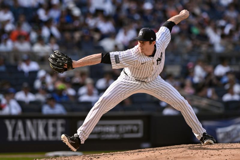 Jun 20, 2024; Bronx, New York, USA; New York Yankees pitcher Tim Hill (54) pitches against the Baltimore Orioles during the fifth inning at Yankee Stadium. Mandatory Credit: John Jones-USA TODAY Sports