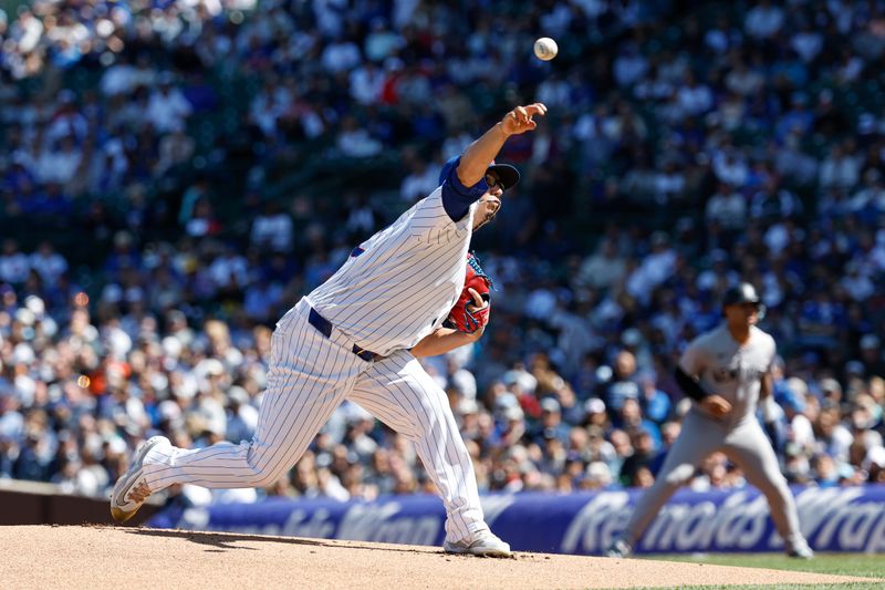 Sep 7, 2024; Chicago, Illinois, USA; Chicago Cubs starting pitcher Javier Assad (72) delivers a pitch against the New York Yankees during the first inning at Wrigley Field. Mandatory Credit: Kamil Krzaczynski-Imagn Images